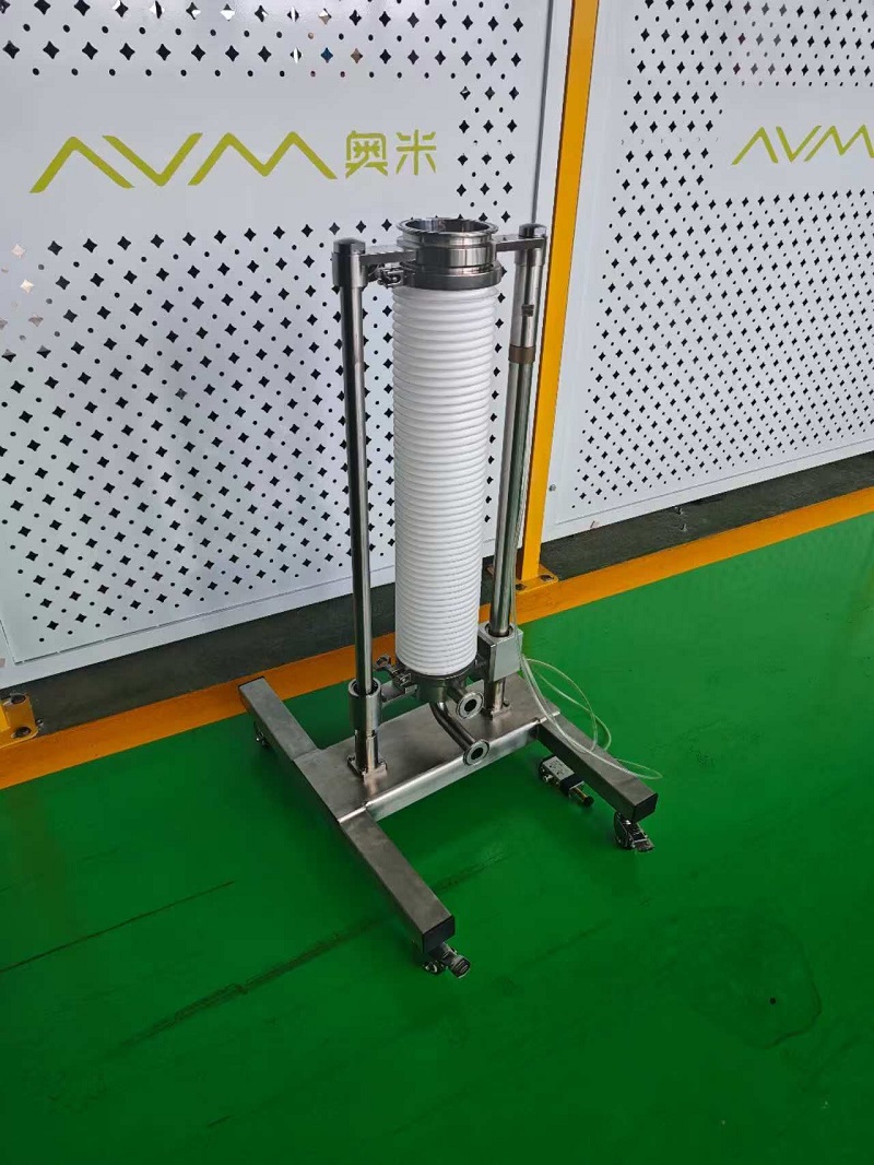 Angled view of AVM passive valve cleaning stand showing its lifting structure and connections